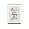 Framed print with 'This is our happy place' text on a beige background
